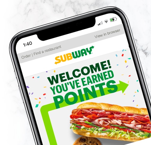 Phone with Subway app opened with Loyalty image. 