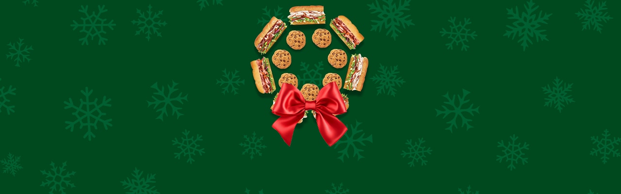 Wreath made of subs and cookies.