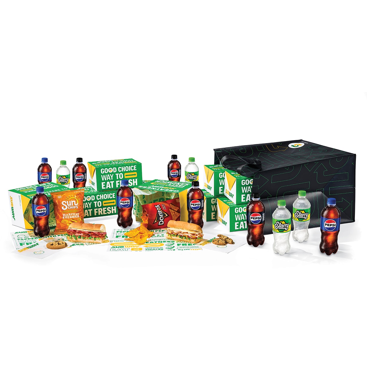 Subway® Catering subs, chips, cookies and Pepsi products on countertop.