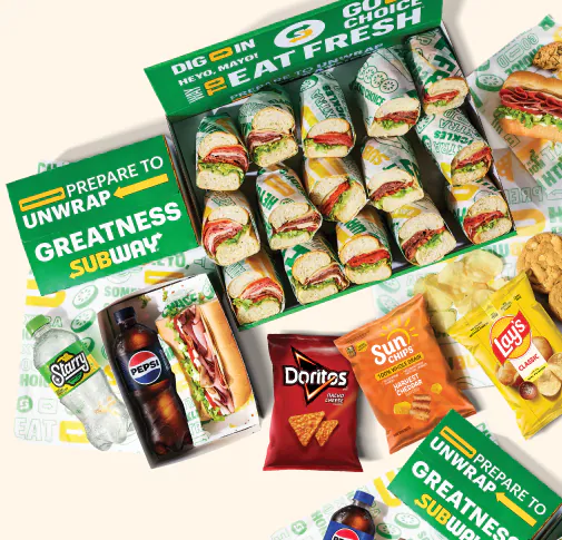 Platter of Subway catering subs, chips & drinks.