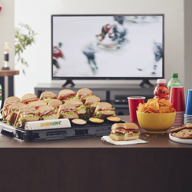 Subs, drinks, chips and cookies